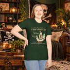 Model wearing the Forest Green Pirate Ship graphic T-shirt, front view
