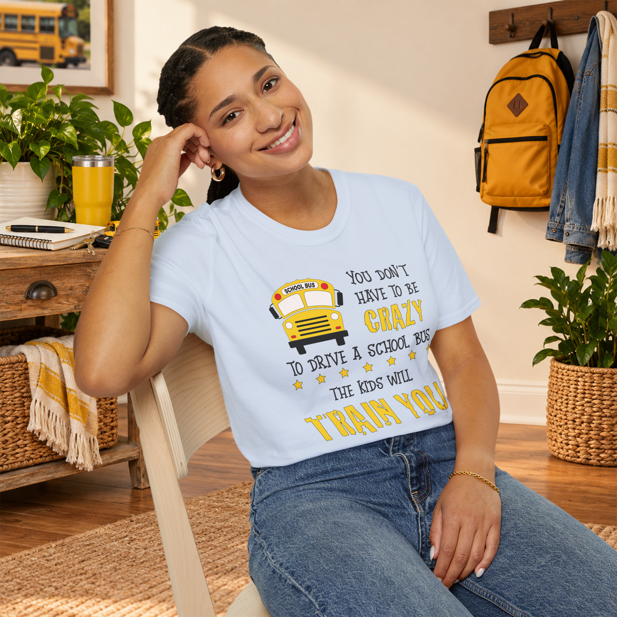 Model wearing the Light Blue Crazy School Bus T-shirt in a lifestyle setting