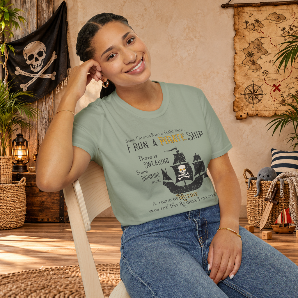 Model wearing the Sage Pirate Ship graphic T-shirt in a lifestyle setting