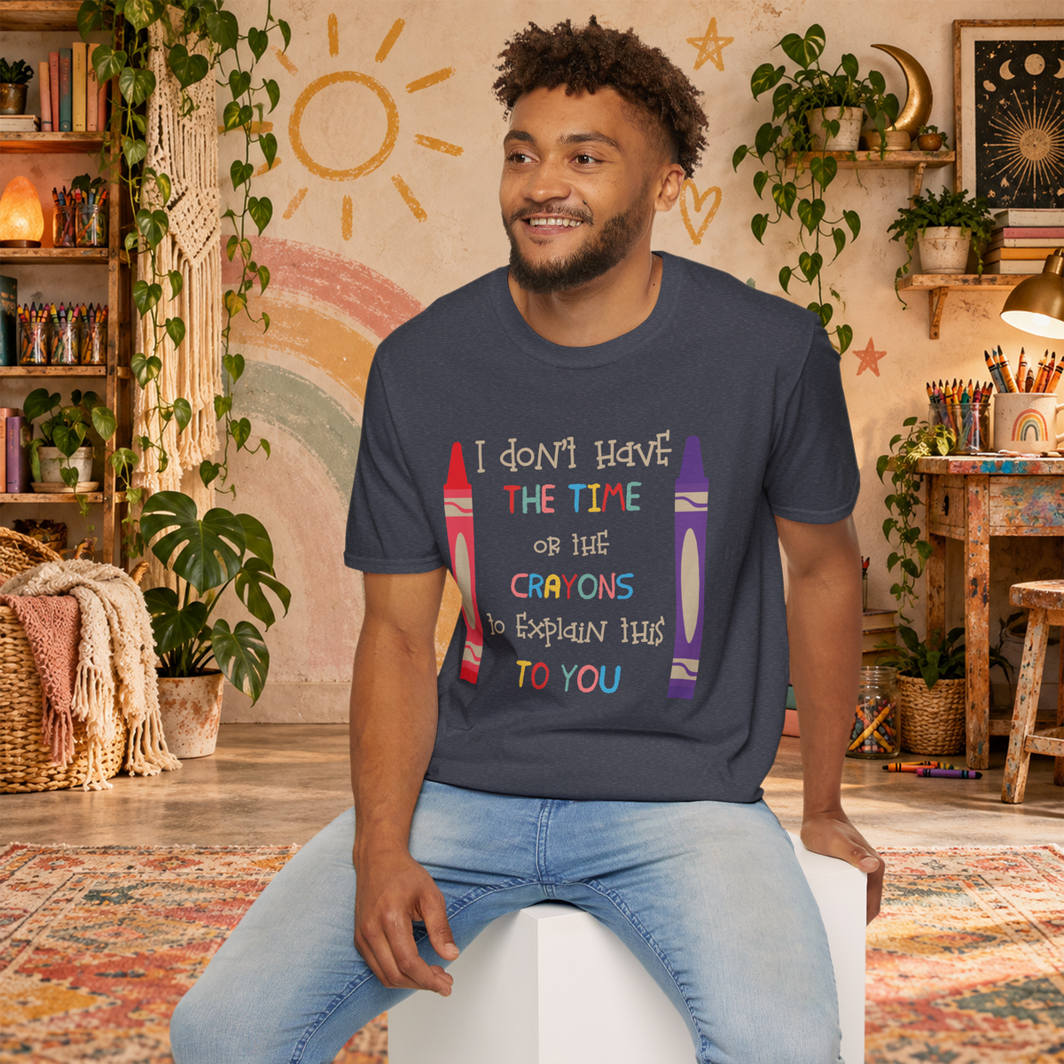 Model wearing the Heather Navy Crayons graphic T-shirt in a lifestyle scene