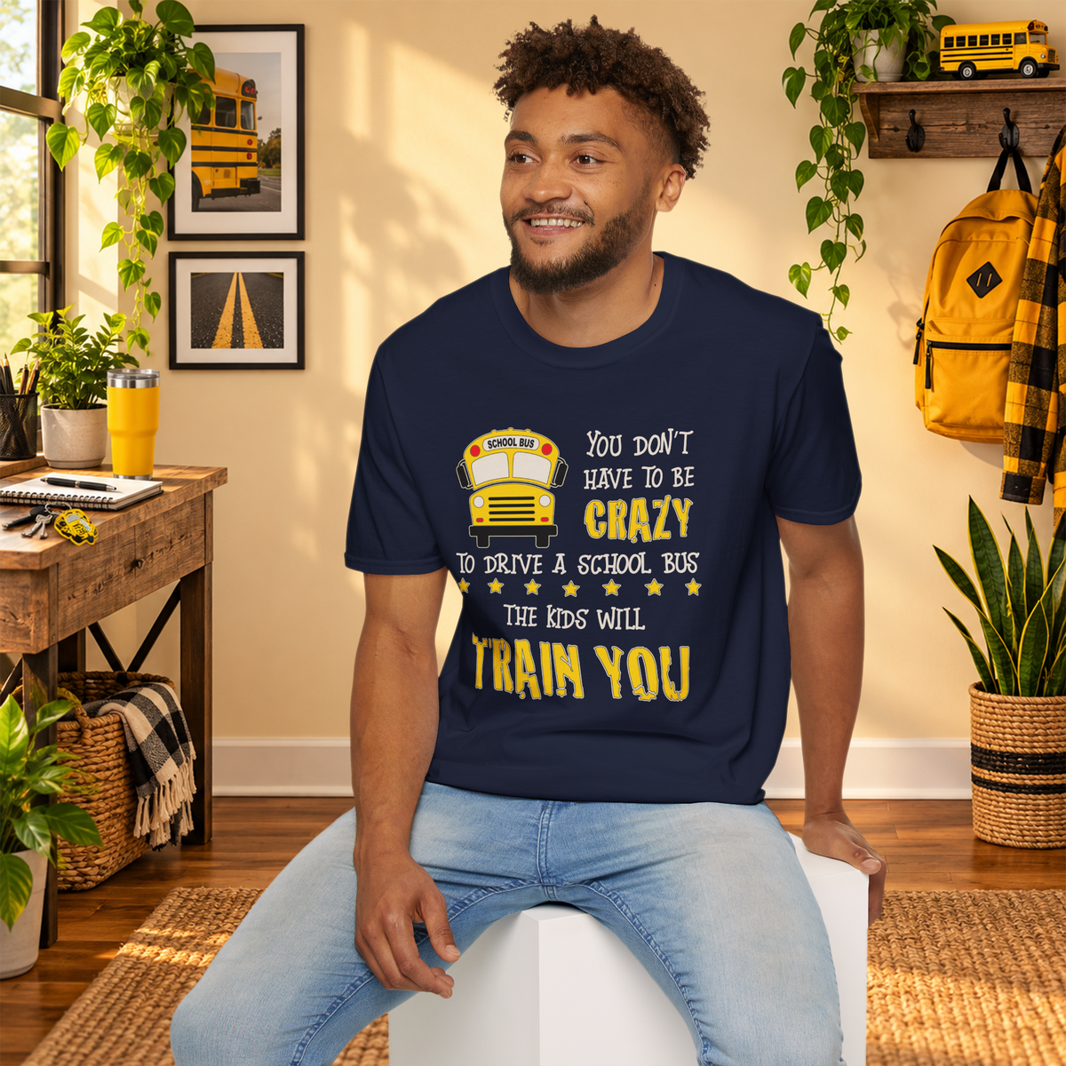 Model wearing the Navy Crazy School Bus T-shirt in a lifestyle setting
