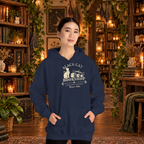 Black Cat Bookshop pullover hoodie in Navy, worn by a standing woman