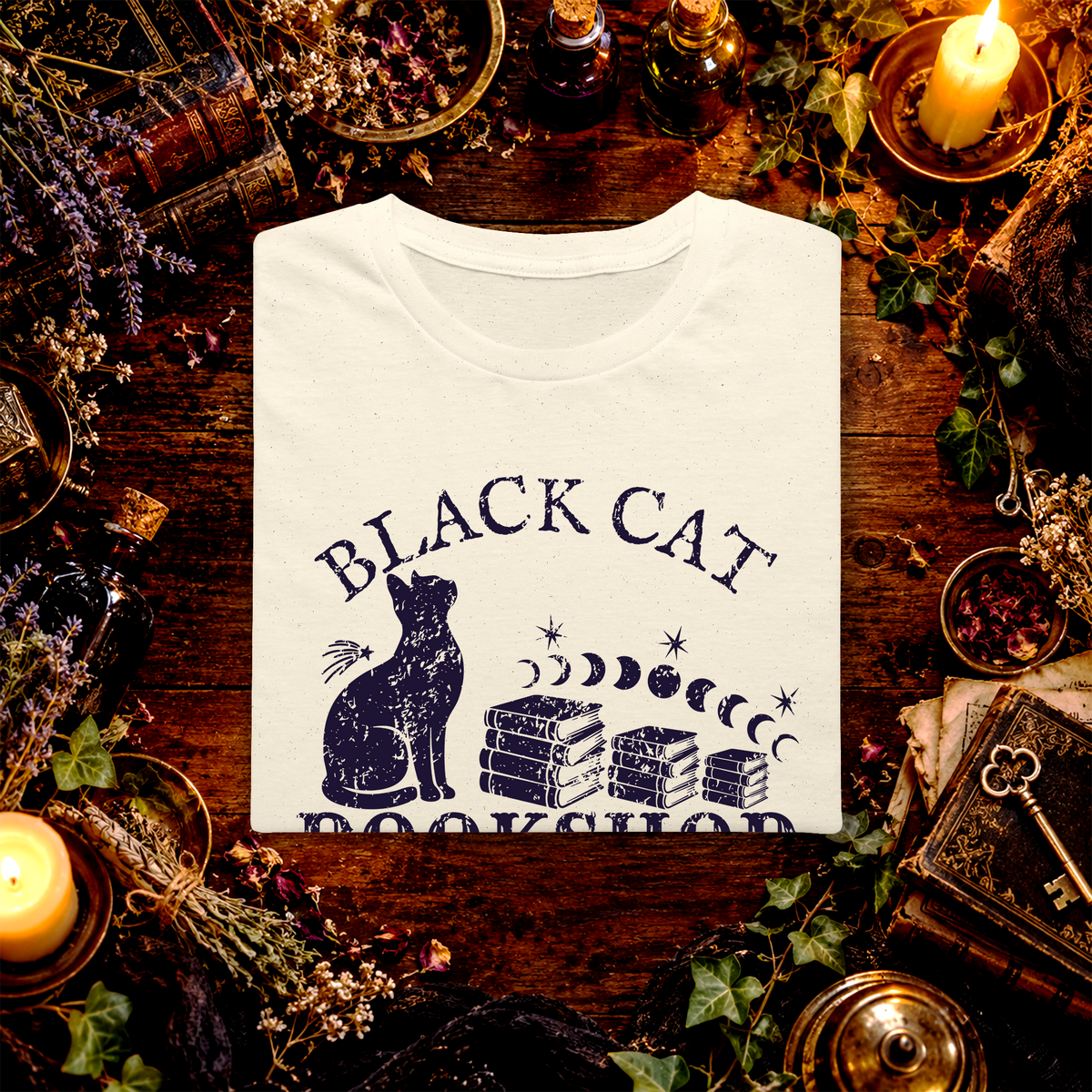 Black Cat Bookshop folded graphic tee mockup