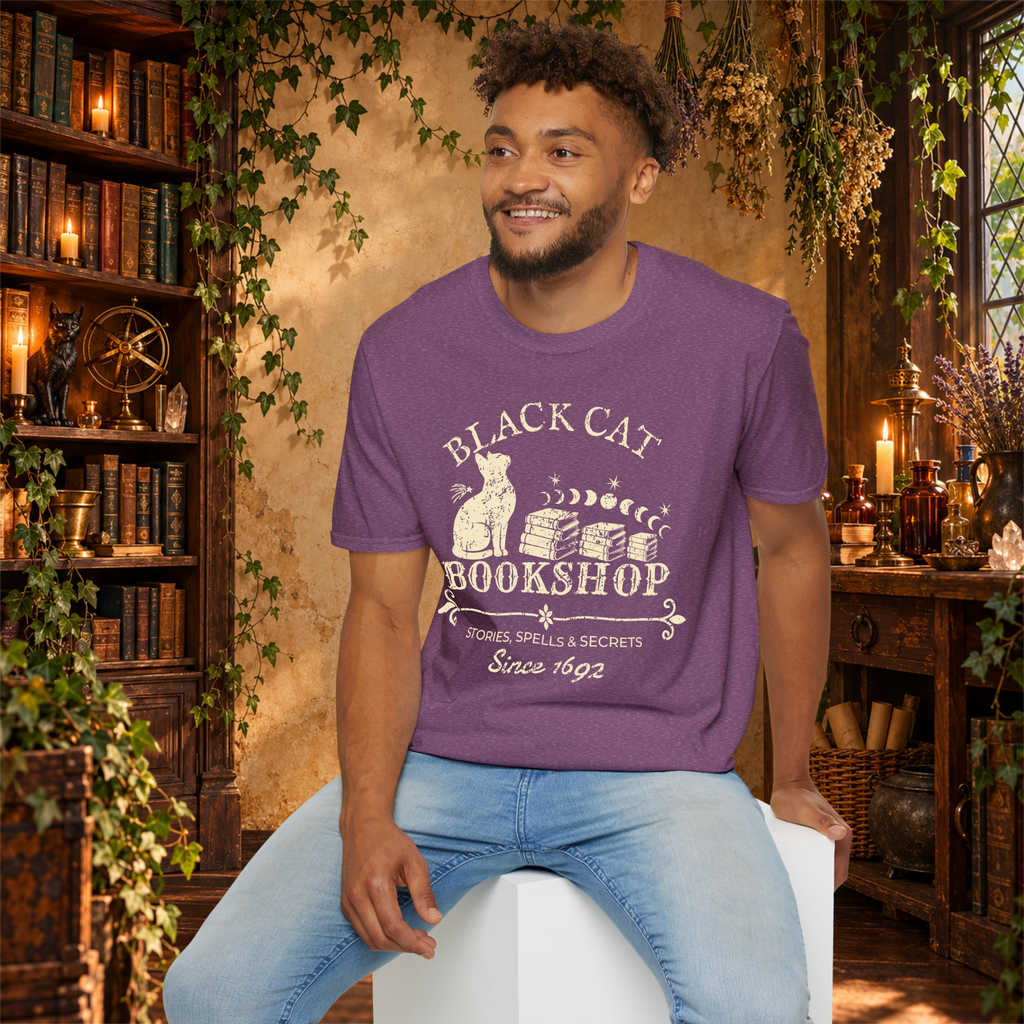 Black Cat Bookshop graphic tee on seated man