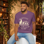 Black Cat Bookshop graphic tee on seated man
