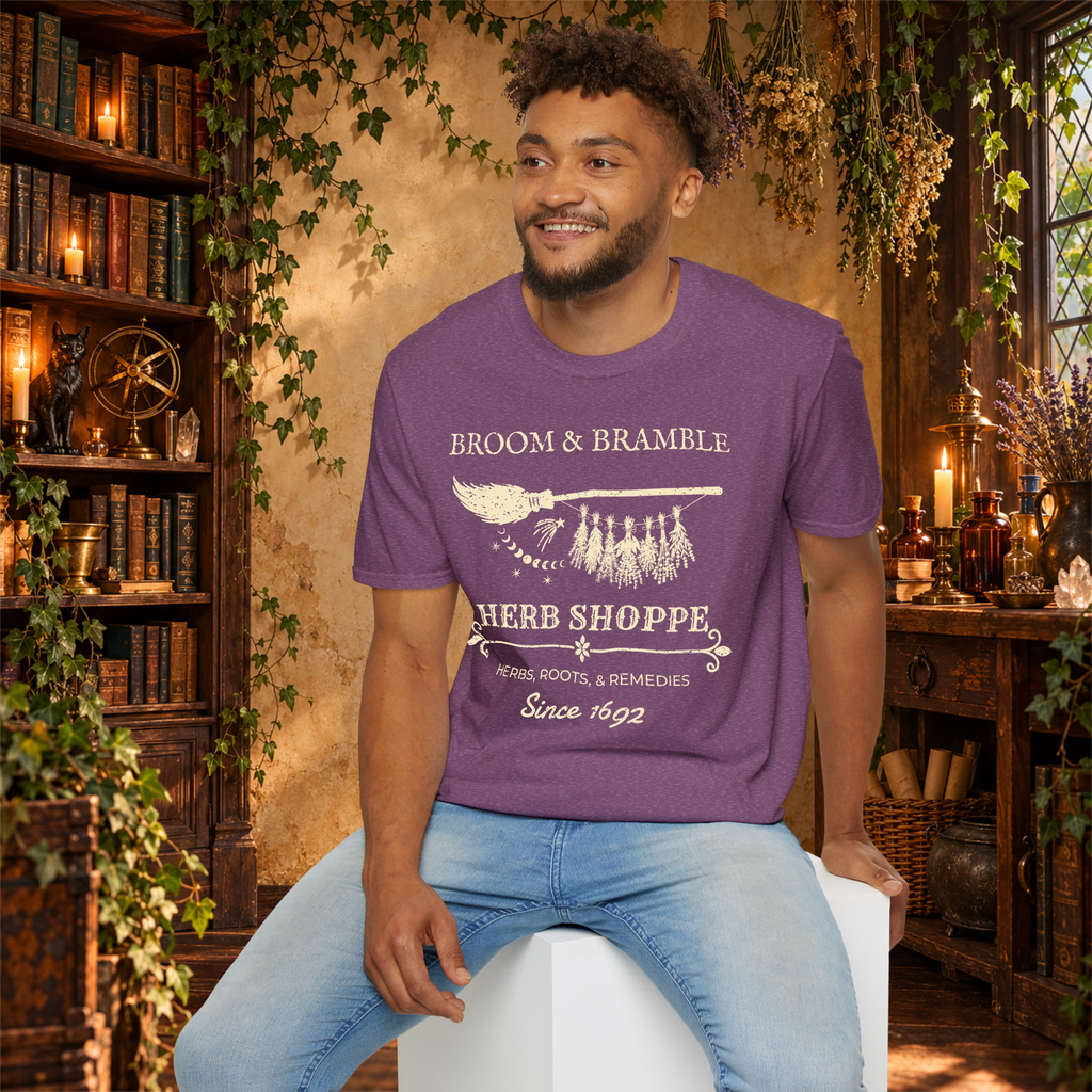 Broom and Bramble graphic tee on seated man