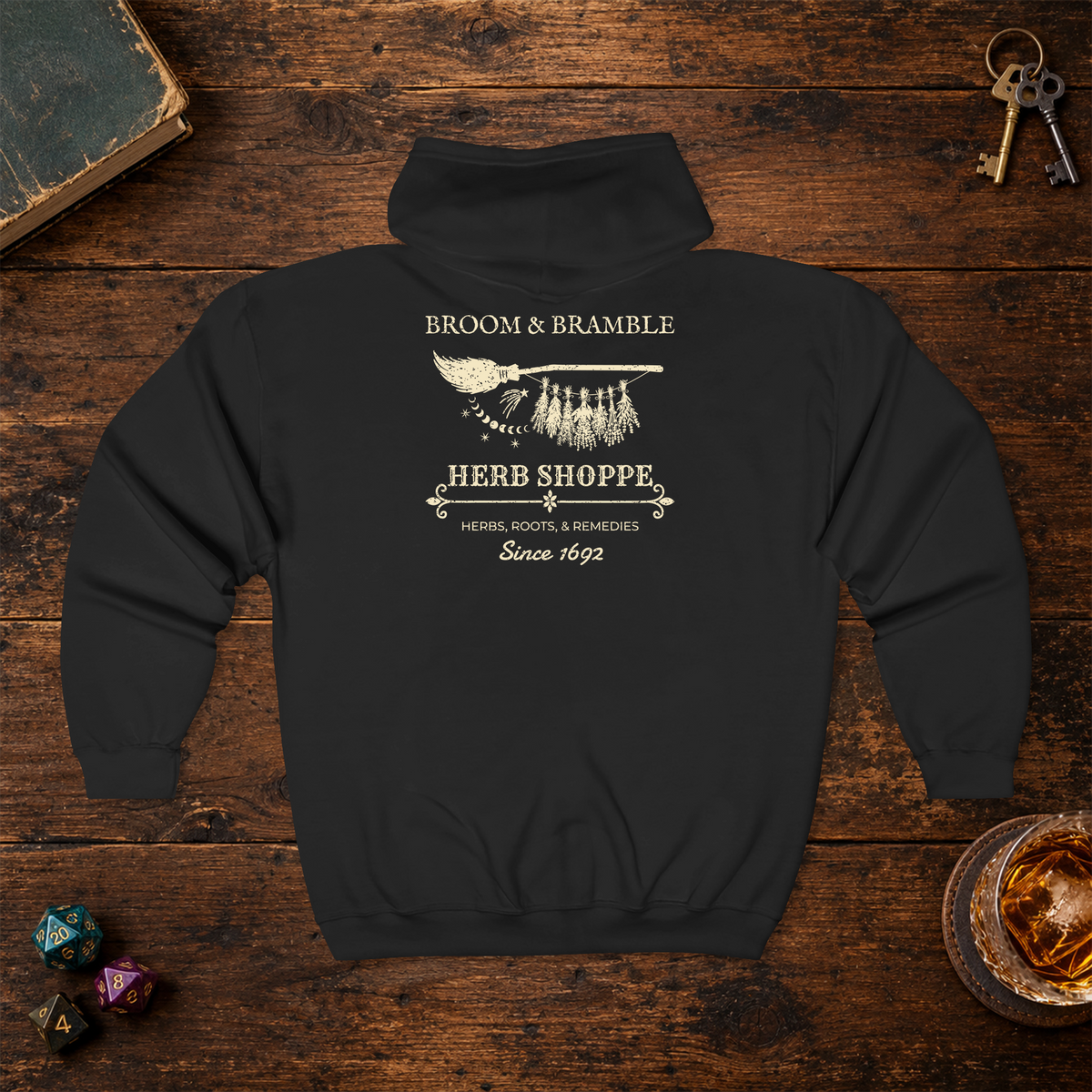 Broom and Bramble full-zip hoodie in Black, back lay-flat mockup