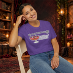 Cats Don’t Drink Cocktails graphic tee on seated woman