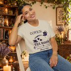 Coven Tea Room graphic tee on seated woman