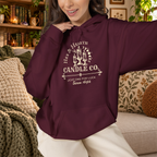 Hex & Hearth Candle Co. pullover hoodie in Maroon, lifestyle mockup