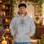 Hex & Hearth Candle Co. pullover hoodie in Sport Grey, worn by a standing man