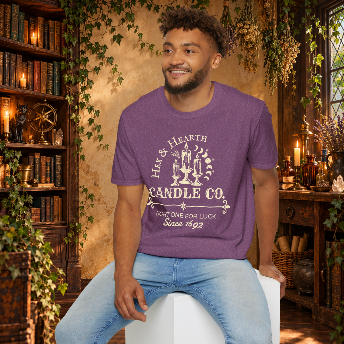 Hex & Hearth graphic tee on seated man