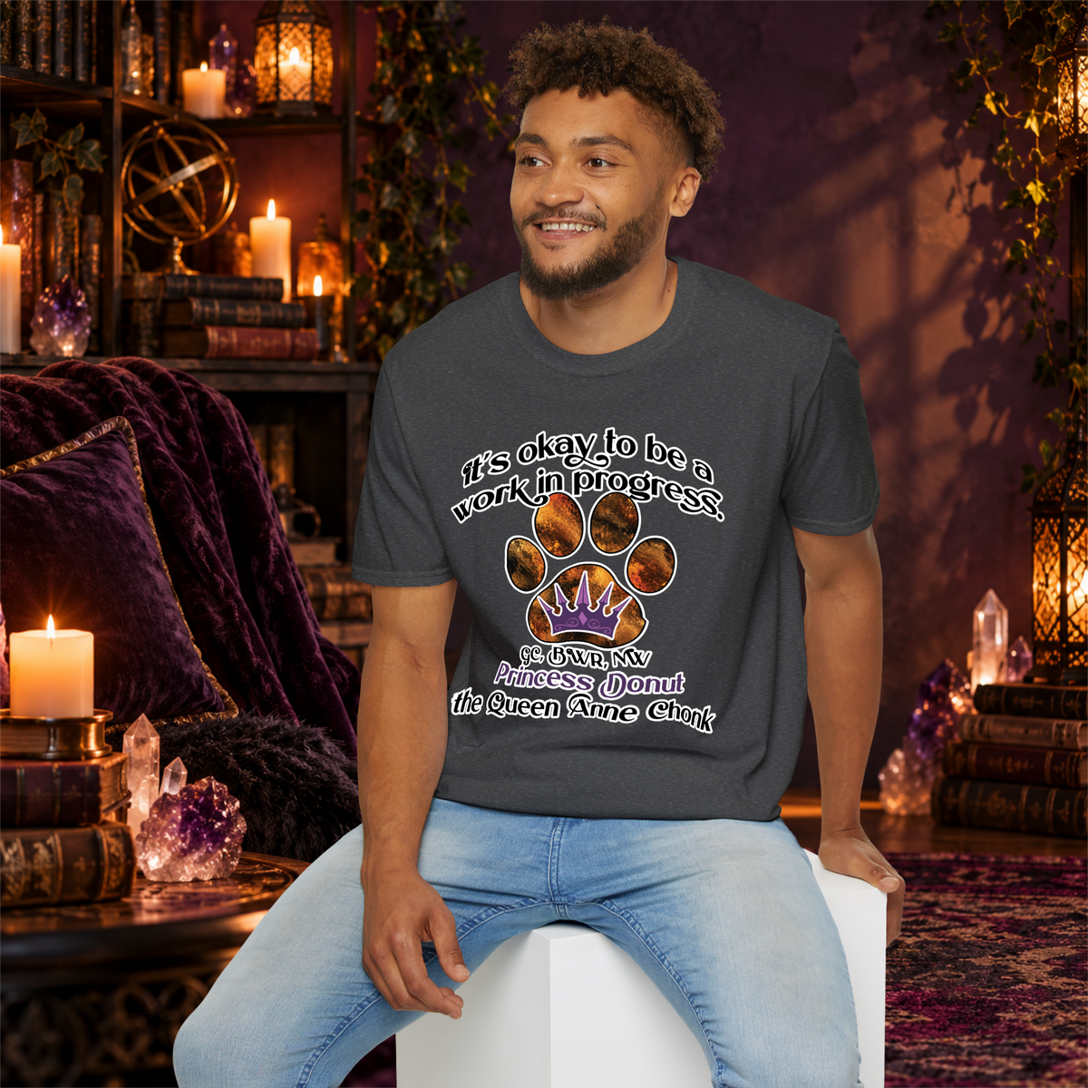 It’s Okay to Be a Work in Progress graphic tee on seated man
