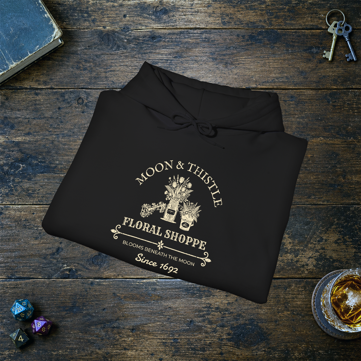 Moon and Thistle hoodie, black folded mockup