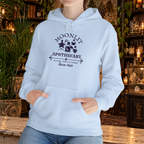 Moonlit Apothecary hoodie in light blue, lifestyle mockup