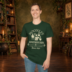 Moonlit Apothecary graphic tee on standing man