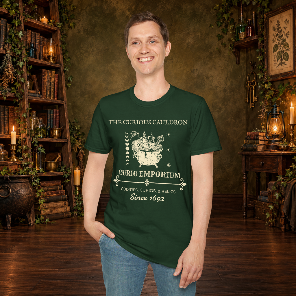 The Curious Cauldron graphic tee on standing man