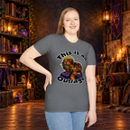 This Is an Outrage graphic T-shirt modeled by a standing woman