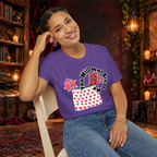You Will Not Break Me graphic T-shirt modeled by a seated woman